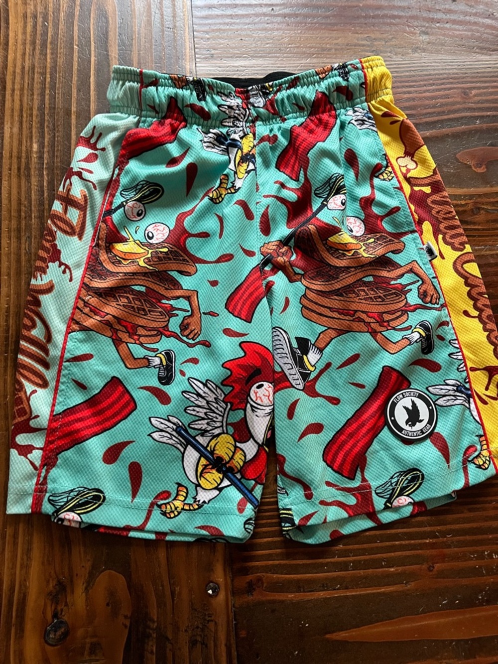 Flow Society Lacrosse Breakfast pattern shorts